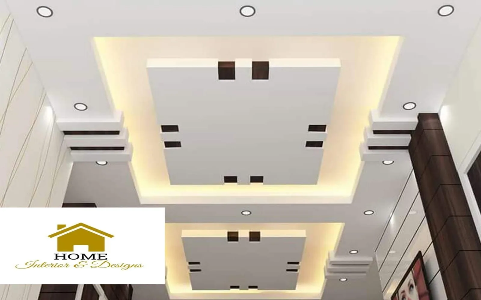 Tiered white ceiling with dark timber bands and warm cove light around a recessed centre.